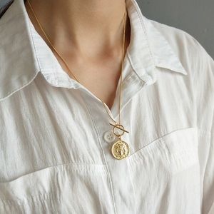 Gold coin necklace